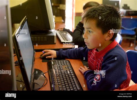 Boy at a computer, computer science lessons, social project, Bogota ...