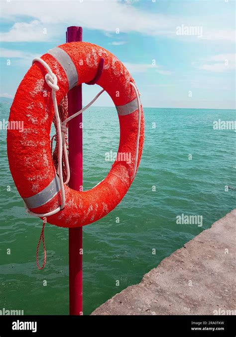 Lifebuoy On The Background Of The Azure Sea Sea Pier In The Sea Close