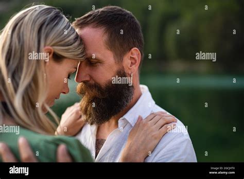 Happy Mature Couple In Love Hugging In Nature Stock Photo Alamy