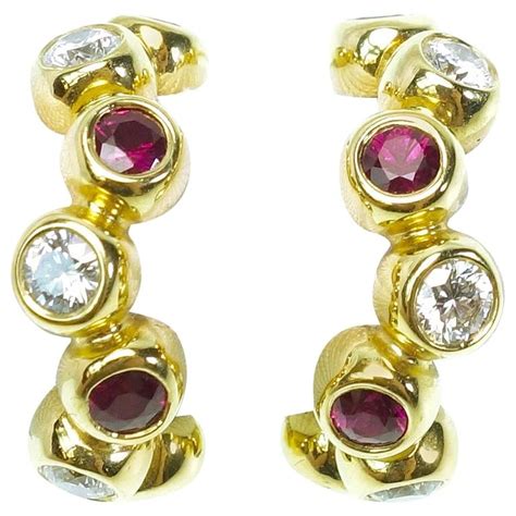 Movado Ruby Diamond Gold Hoop Earrings at 1stDibs