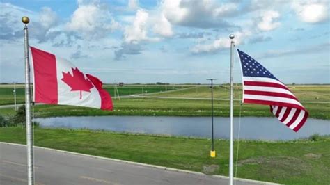 American flag and Canadian flag waving a... | Stock Video | Pond5