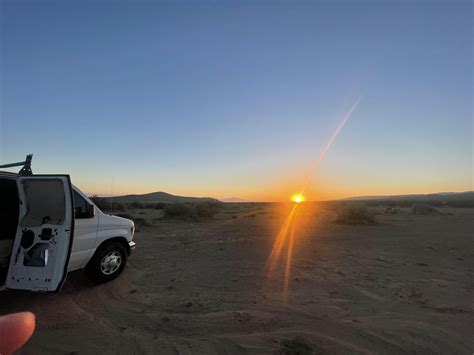 Covert Van. Hidden solar panels on top of ladder. Saves putting holes