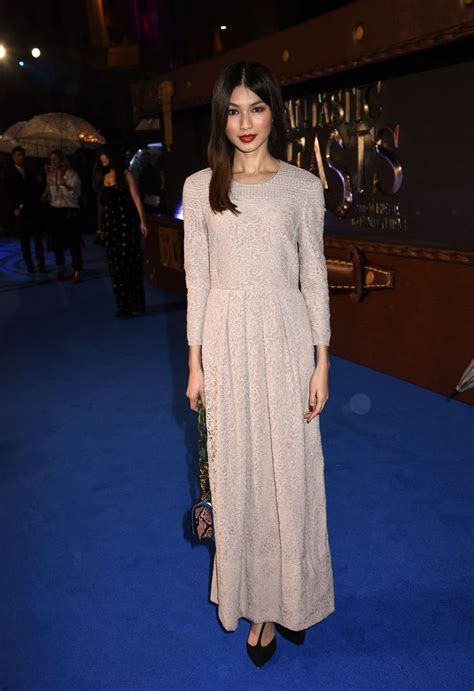 British Actress Gemma Chan Wearing A Burberry Dress To The Premiere Of