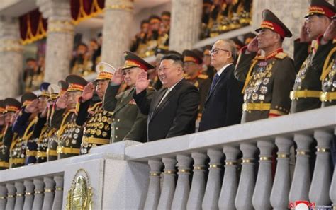 Kim Jong-un and Putin's defence chief laugh at military parade | World ...