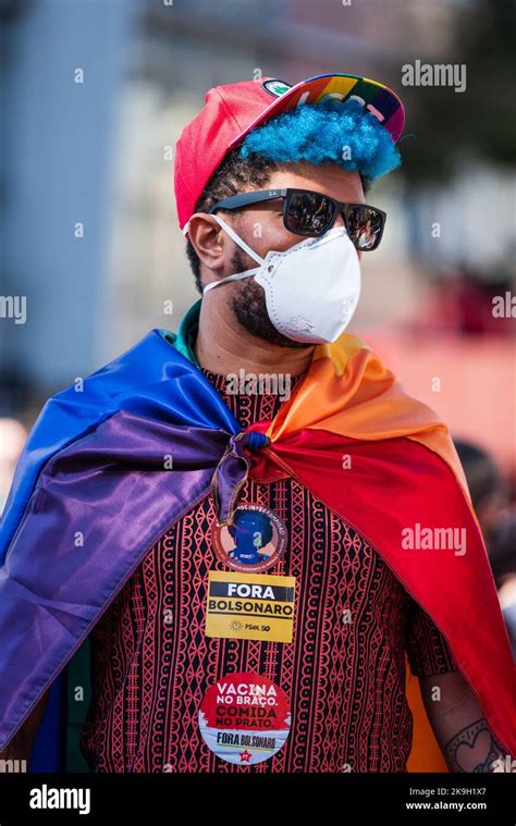 Man With Blue Hair And Gay Pride Flag At A Protest Against Bolsonaro In Belo Horizonte Brazil