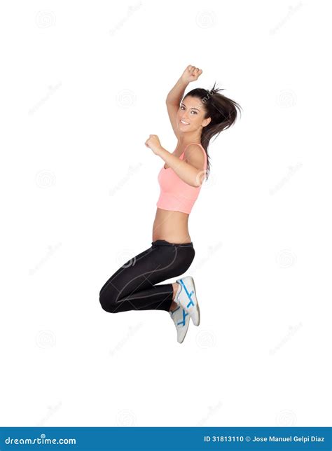 Attractive Brunette Girl With Fitness Clothing Jumping Stock Photo