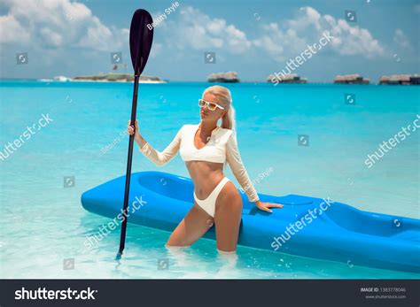 Sexy Blond Bikini Model Paddling Kayak Stock Photo 1383778046 Shutterstock