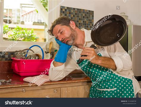869 Men Doing Housework Funny Images, Stock Photos, and Vectors