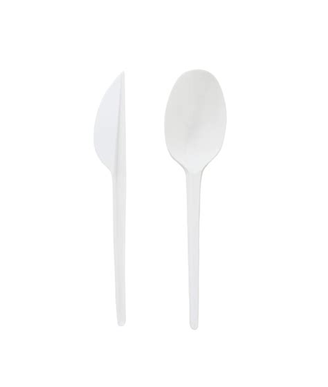 Premium Photo White Plastic Disposable Spoon And Knife Isolated On