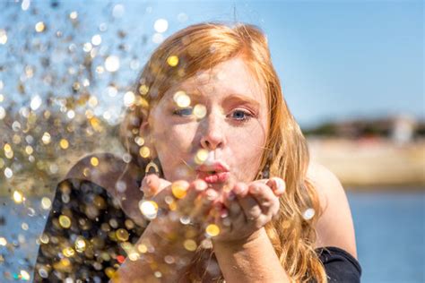 Blowing Glitter Photography