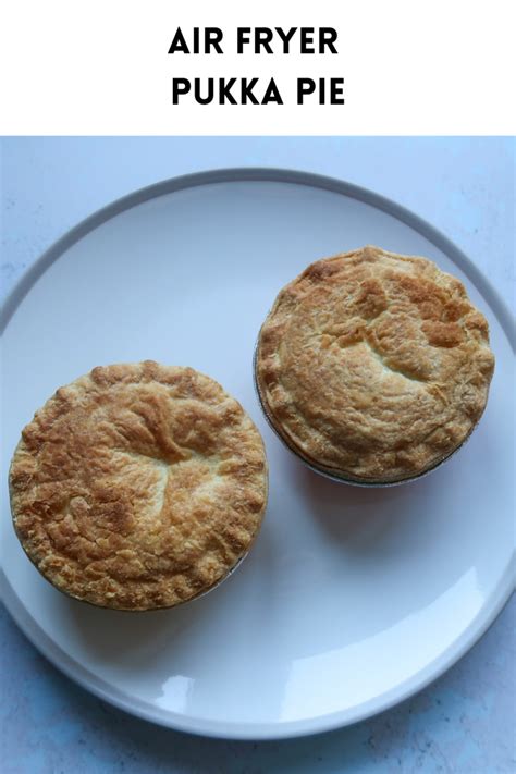 Two Small Pies On A White Plate With The Words Air Fryer Pukka Pie