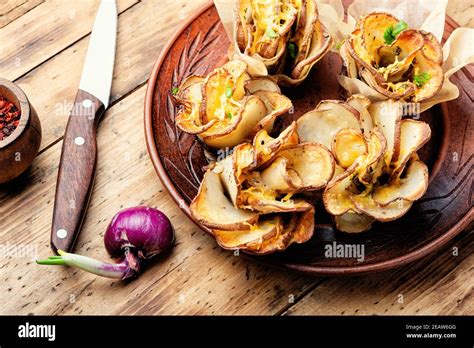 Baked potatoes in bacon Stock Photo - Alamy