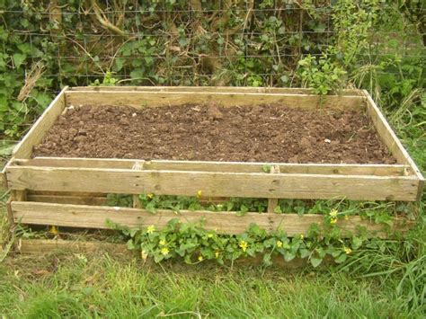 25 DIY Ideas Using Pallets for Raised Garden Beds - Snappy Pixels