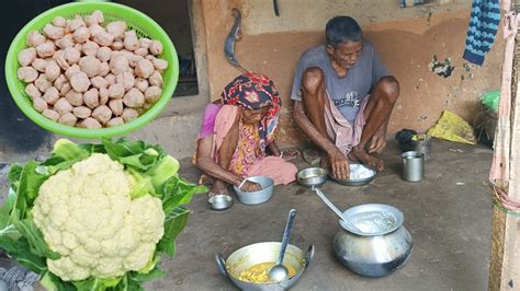 Rural Old Poor Grandma Cooking Cauliflower With Soyabin Curry Actual