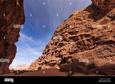 Wadi Rum Natural Eroded Gorge In Desert And View Of Eroded Rocky