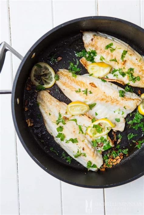 Pan Fried Seabass With Garlic Lemon Butter Sauce And Spring Vegetables