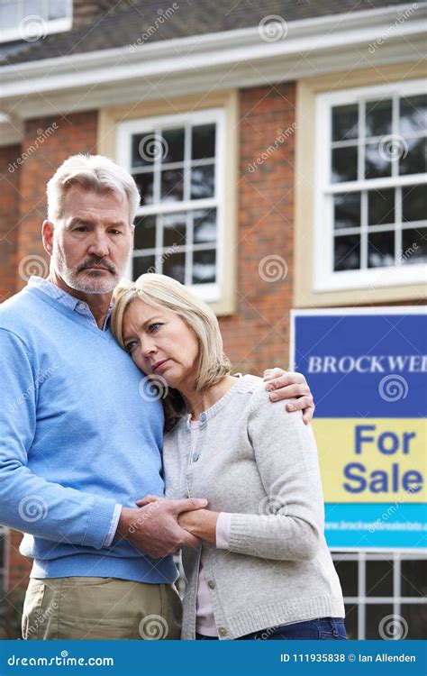 Mature Couple Forced To Sell Home Through Financial Problems Stock Photo Image Of Debt
