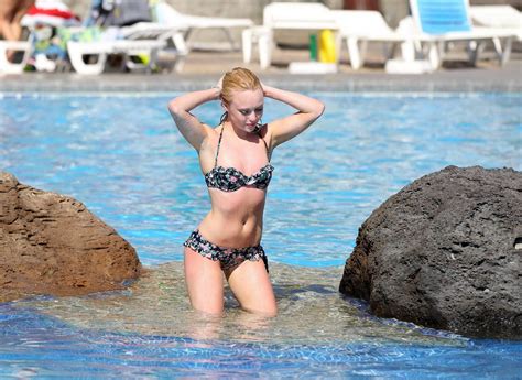 Jorgie Porter Showing Off Her Hot Body In A Skimpy Floral Bikini At The Beach In Porn Pictures