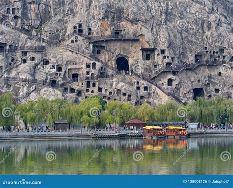 Luoyang Longmen Grottoes. Broken Buddha and the Stone Caves and ...