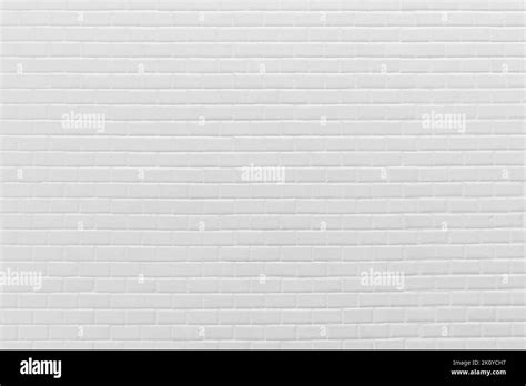 Abstract Weathered Texture White Brick Wall Background In Rural Room