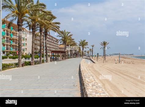 Maritime Promenade And Mediterranean Beach In Catalan Village Of Costa