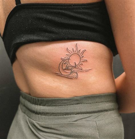 Sun And Moon Rib Tattoo TheFab20s