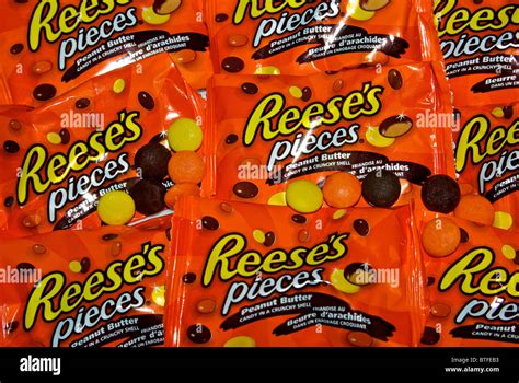 Individual packages of Hershey Reese's Pieces peanut butter candy in a crunchy shell Stock Photo ...