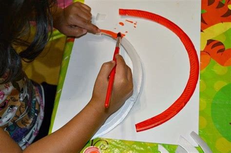 fine motor skills painting rainbows – Fun Littles