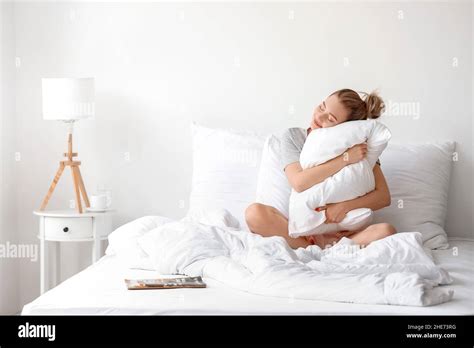 Beautiful Woman Hugging Pillow Hi Res Stock Photography And Images Alamy