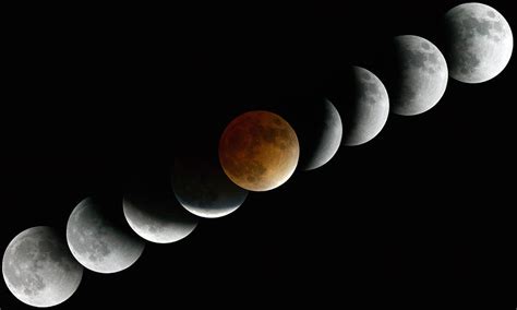 Cycle Of Lunar Eclipse Photograph by Michael Melford