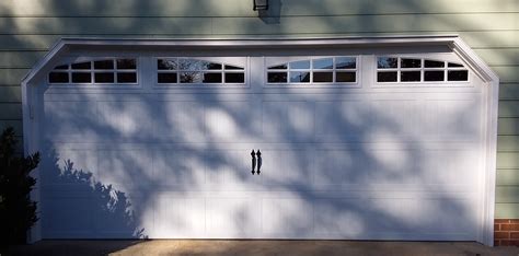 16x7 Model 5216 Carriage Style Garage Door With Arched Stockton Top Glass And Decorative Hardware