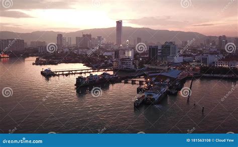 Aerial View Penang Ferry And Georgetown During Dramatic Sunset Hour