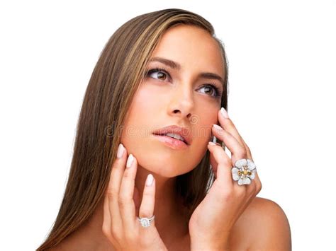 She Takes Skincare Seriously Studio Shot Of A Beautiful Brunette Woman Isolated On White Stock