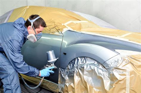 Worker painting a car. — Stock Photo © lorakss #19441441