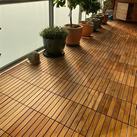 Pose De Carrelage En Bois Sur Le Jardin Balcon Et Terrasse