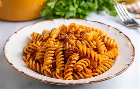 Premium Photo Fusilli Pasta Spiral Or Spirali Pasta With Tomato