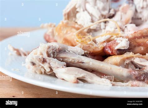 A Close Up Of Chicken Bones From A Roast Chicken Carcass Stock Photo