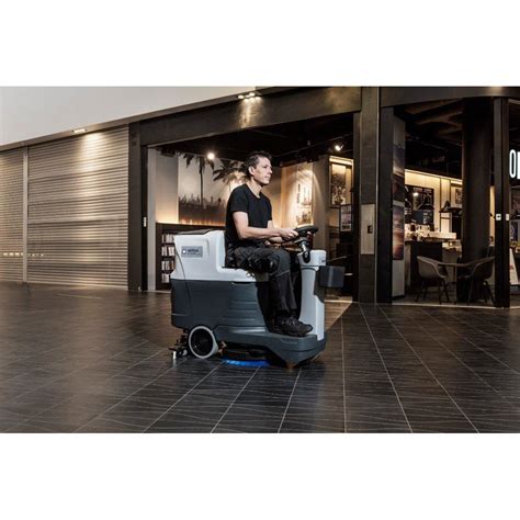 Nilfisk Sc Ride On Scrubber Dryer Candor Services