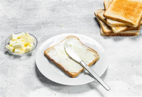 Premium Photo | Breakfast Toasted bread and butter