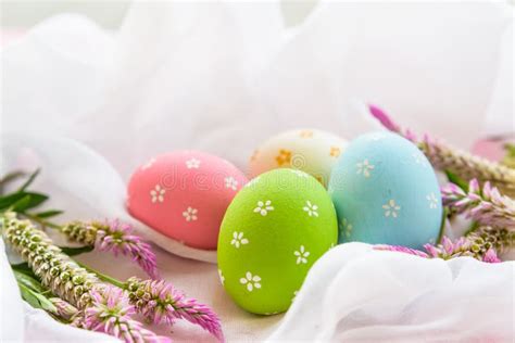 Happy Easter Colorful Of Easter Eggs In Nest With Flower Pape Stock