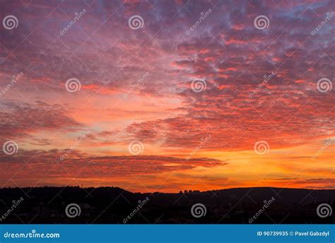 Colorful Dawn With Spectacular Clouds And Line Of Horizon Stock Image