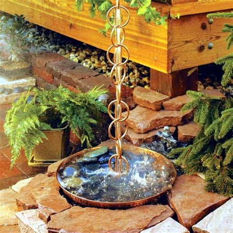 The rain chain downspout instead serves as a creative decoration in the ...