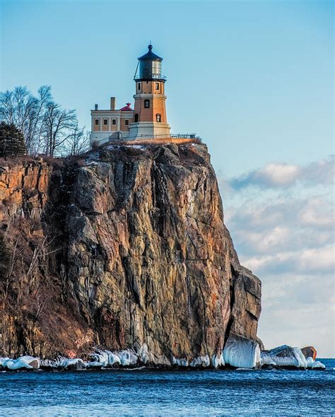 Split Rock Lighthouse In Winter Photograph by Paul Freidlund - Pixels