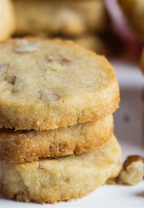 Pecan Sandies Cookies Stacked Up With Chopped Pecans On The Side Pecan Sandie Recipe Sandies