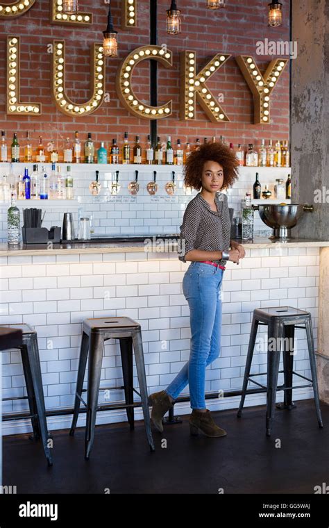 Woman Standing At A Bar Hi Res Stock Photography And Images Alamy