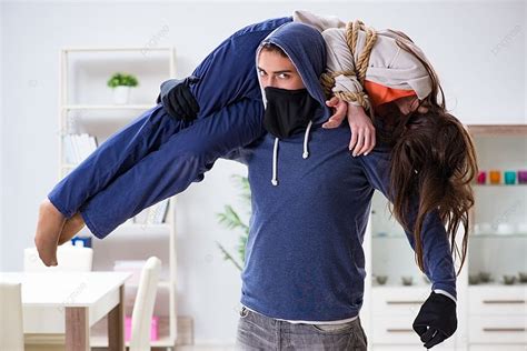 Armed Man Assaulting Young Woman At Home Photo Background And Picture