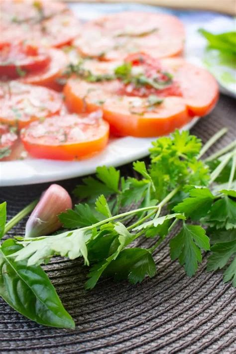 Sliced Tomato Salad With Basil Garlic And Olive Oil Sustain My