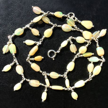 Эфиопский натуральный опал бусы купить в Москве с доставкой по России