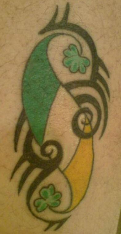 Ireland flag on tribal tattoo - Tattooimages.biz