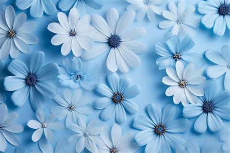 Premium Photo | Blue background decorated with fresh flower petals